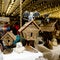 Decorative handmade huts on chicken legs at fair