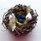 Decorative handmade nest with two birds