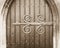 Decorative Iron Work on a Church Door in Sepia Tone