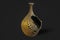 Decorative jug `Broken amphora` on dark gray background