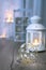 Decorative lantern, candles and Christmas decorations