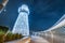 decorative lighthouse near the parking lot of yachts and ships in the Dubai Creek Marina Harbor. Travel and tourist