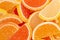 Decorative marmalade candy Background. Pattern of marmalade in shape of citrus fruits wedges. Jelly sweet candies