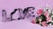 Decorative metal letters, love text, red flowers, greeting card on pink background. Declaration of love and term of affection