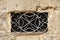 The decorative metal ventilation grill in form of Maltese cross