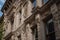 decorative molding and carvings adorn the exterior of a historic building