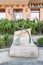 Decorative monument symbolizing crossed tree and musical instrument in the square in Tbilisi city in Georgia