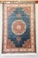 Decorative multi-colored woolen rug with oriental ornaments