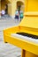 Decorative musical piano stands on the street