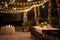 Decorative night garden wedding outdoor in garden with warm glow string lights. Generative AI