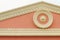 Decorative pink European style gable pattern with white stucco o