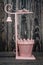 Decorative Pink Wrought Iron Flowerpot Holder with Bell and Bird