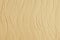 Decorative plaster. Wall stucco texture. In style waves, beige color.