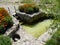 Decorative pool for the baptism of swimming in the sunny summer horizontal photo