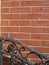 Decorative railing, brick wall