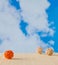 Decorative rattan balls against the blue sky with clouds