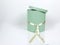 Decorative Round Teal Hat Box with Cream colored ribbon isolated