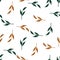 Decorative seamless pattern with orange and green random simple leaf branches shapes. White background