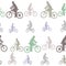 Decorative seamless pattern of silhouettes cyclists on bicycles