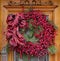 Decorative seasonal wreath with red berries