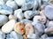 Decorative smooth white river stone pebbles in closeup view.