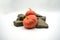 Decorative squashes Hokkaido squash with stones isolated on wh