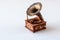 The Decorative statuette of gramophone on white background