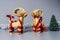 Decorative straw Christmas Reindeer with red ribbons, Merry Christmas And Happy New Year, Christmas trees
