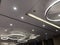 A Decorative Suspended Gypsum false ceiling interiors with Circle shaped LED Lighting for an Banquet hall to carryout an Grand