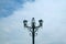 Decorative Vintage Streetlamp against Cloudy Sky