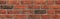 Decorative wall texture, background. Rusty, matted, red bricks