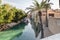 Decorative water channel around the bazaar and shopping mall - Souk Madinat Jumeirah in Dubai city, United Arab Emirates