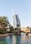 Decorative water channel of the bazaar and shopping mall - Souk Madinat Jumeirah and the Burj Al Arab Hotel in Dubai city, United