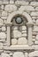 Decorative window of limestone masonry
