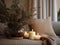 Decorative winter arrangement with fir and candles in cozy home interior, stylish room decor for Christmas holiday