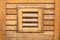 Decorative wooden boards texture made to look like window blinds on new wooden house wall