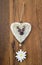 Decorative wooden heart with deer and edelweis flower