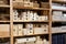 Decorative wooden jewelry storage caskets on shelves in store