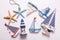 Decorative wooden toys boats, lighthouse and starfishes on tex