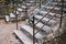 Decorative wrought iron handrail on external stone stairs Marche, Italy