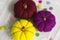 Decorative yelllow, violet and red pumpkins made from felt