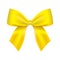 Decorative yellow bow. Vector bow for page decor isolated on white