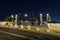 Decoratively decorated metal gates at the upper entrance to the Bahai Garden, located on the Louis Promenade at night, in Haifa ci