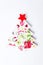 Decoupage Christmas tree decoration on white