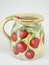 Decoupage decorated strawberry pattern pitcher on white