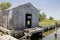 Decrepit crab shack on shore of Chesapeake Bay