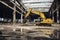 Decrepit Industrial Site with a Bold Yellow Excavator in Focus.