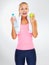 Dedicated to a great life. Studio shot of an attractive young woman in exercise clothing against a gray background.