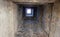 Deep ancient well. Masonry. Light at the end of the tunnel. Background