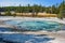 Deep azure thermal spring by in Yellowstone National Park